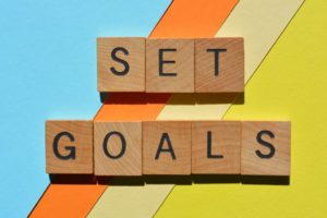 set goals written out in wooden tiles