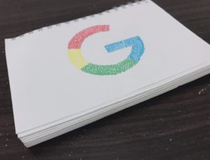 google logo drawn on notepad